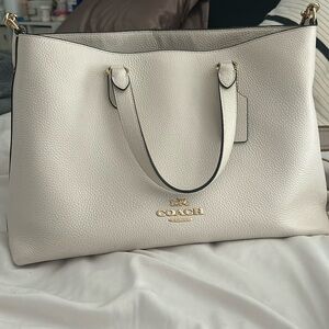 Cream colored Coach tote